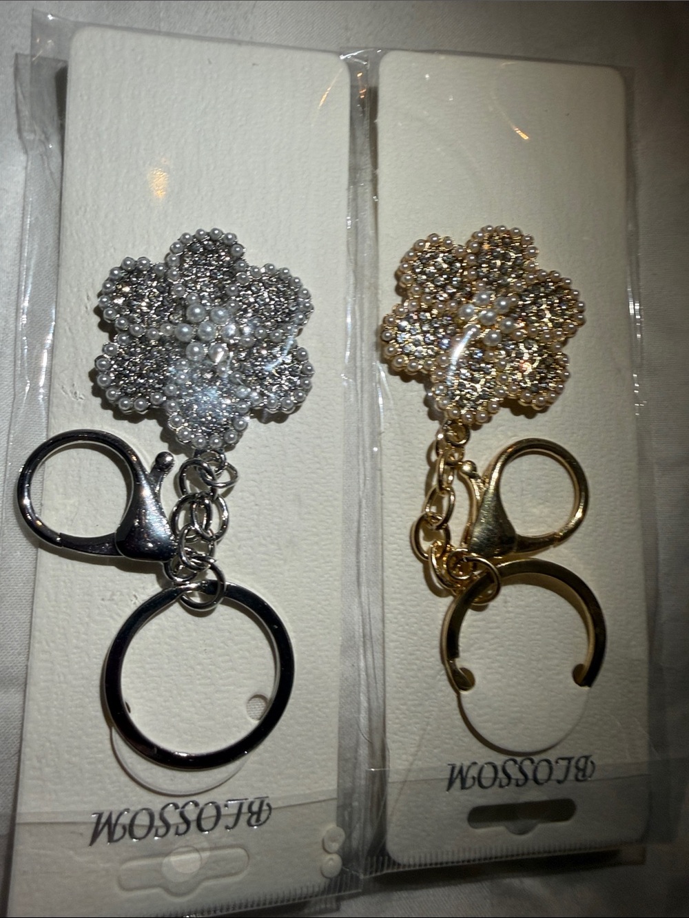 Pearl and Rhinestone flower charm keychain available in silver and gold